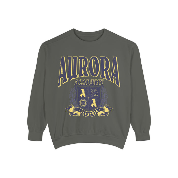 Bloodwing Academy merchandise from thtgrlreads featuring a vintage wash Comfort Colors crewneck sweatshirt with a bold yellow and purple Aurora Academy crest graphic and collegiate-style text.