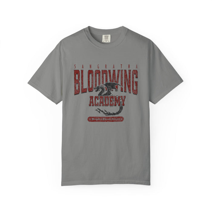 Bloodwing Academy comfort colors graphic tee by thtgrlreads features a vintage washed gray fabric with a distressed red and black dragon print, perfect for fandom fans of the Bloodwing Academy collection.