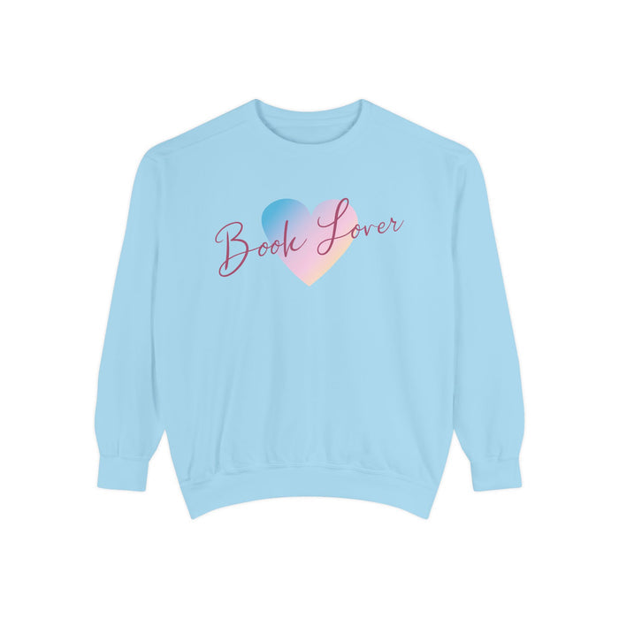Thtgrlreads cozy oversized crewneck sweatshirt in pastel blue from the Book Bestie collection, featuring a gradient heart graphic and elegant "Book Lover" script text.