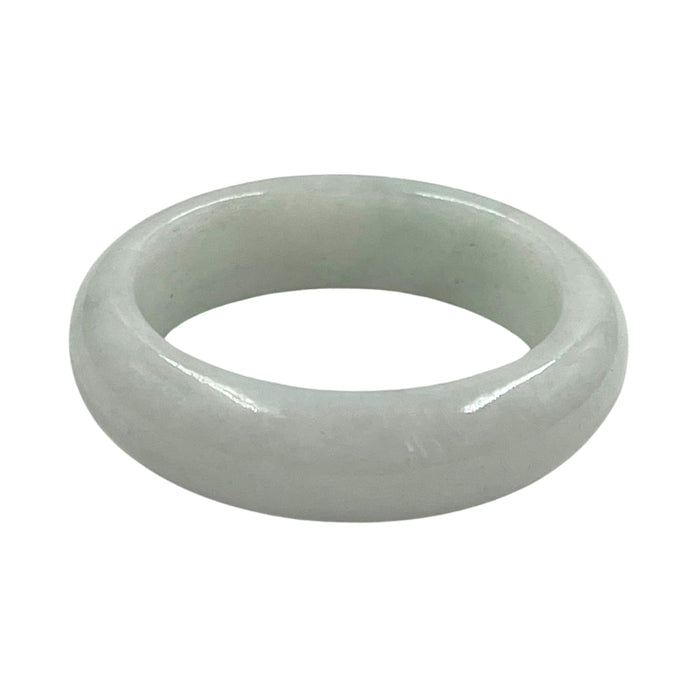 A smooth, polished light green jade bangle ring on a solid white background.
