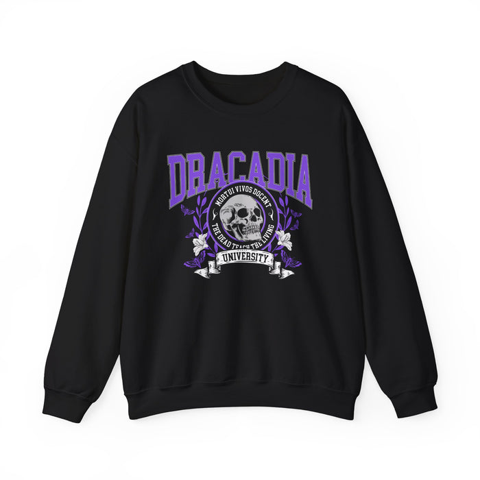 Nocticadia book merch by thtgrlreads featuring a black oversized crewneck sweatshirt with a vintage puff print graphic of "Dracadia University" in purple gothic font and a detailed skull emblem, part of the Crewnecks collection.