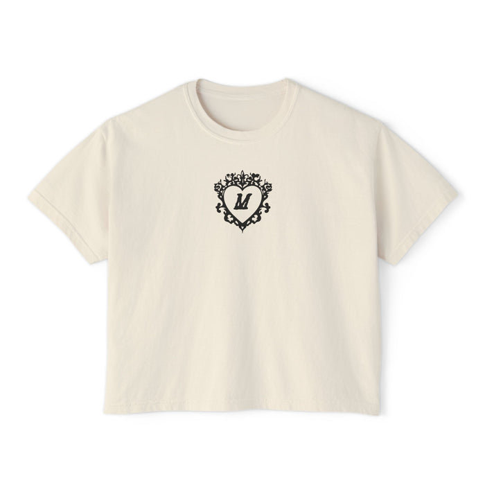 thtgrlreads Liv Zander collection vintage-washed cream crop top featuring a black intricate heart design with the letter "M," made from premium Comfort Colors fabric.