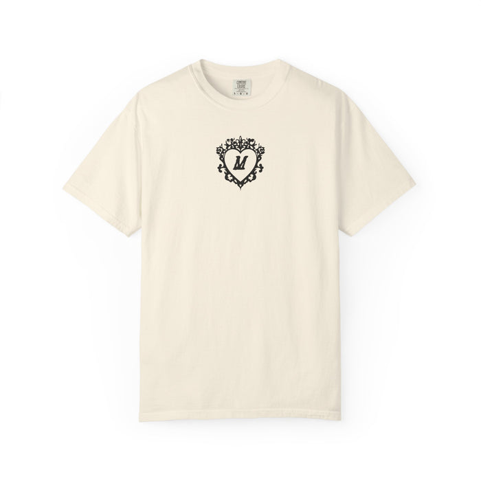 Liv Zander collection Comfort Colors graphic tee from thtgrlreads featuring a vintage wash cream fabric and a black ornate heart with the letter M printed on the chest.