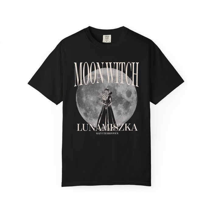 Thtgrlreads officially licensed Moon Witch Comfort Colors graphic tee from The Eating Woods collection featuring vintage-wash black fabric with a large moon and witch illustration in soft gothic fonts.
