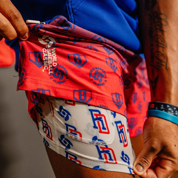 Adult model wearing multi-color Pro Series with Liner Dominican Republic shorts