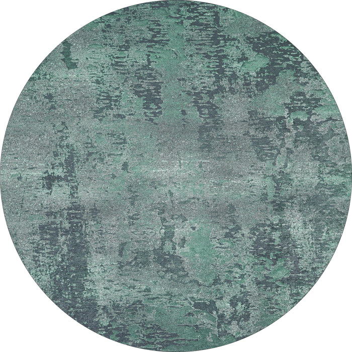 The Smokey Mountains - Washable Rug - JR1631 features an oval shape and textured pattern in green and gray tones, resembling a weathered painted surface—perfect for high-traffic areas.