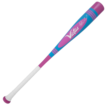 The 2025 Victus Vibe Pro-Crayon Fernando Tatis Jr (-10) bat features a white grip, purple handle, blue/purple barrel with turquoise stripes, white Victus logo, outlined graphic, and a comfort-focused vibration-reducing knob.