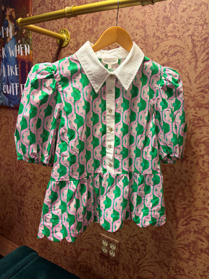 Entro Mod Floral Blouse featuring a stylish floral pattern and lightweight fabric, ideal for casual or semi-formal wear.