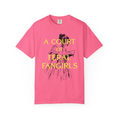 Thtgrlreads oversized Comfort Colors graphic tee from the Off Brand and Book Bestie collections, featuring a vintage-style black sketch of a woman reading with bold yellow text reading "A Court of Feral Fangirls.