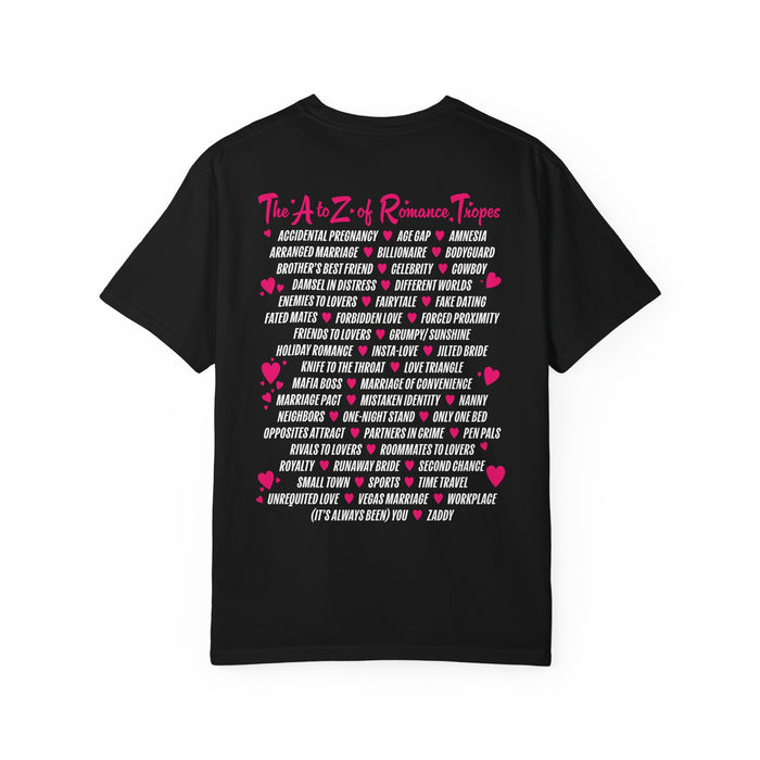 Romantasy-themed black Comfort Colors graphic tee by thtgrlreads, featuring a vintage wash and bold pink and white print listing romance tropes, from the Book Bestie collection.