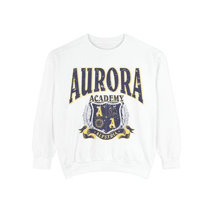 A white oversized crewneck sweatshirt from thtgrlreads featuring vintage puff print text and crest graphic from the Aurora Academy collection, part of Ruthless Boys of the Zodiac and Back to School crewnecks.