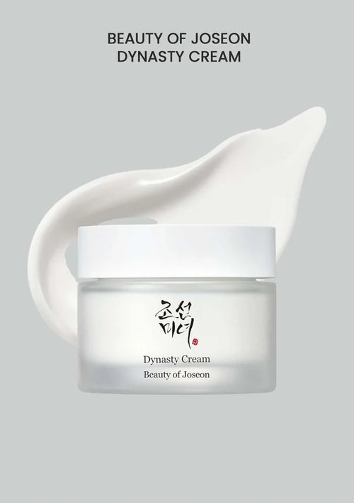 Beauty of Joseon Dynasty Cream jar with a white cream smear on a gray background