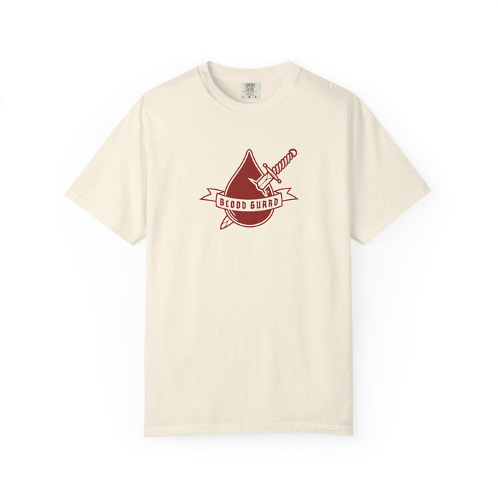 Thtgrlreads Bloodwing Academy collection features a vintage wash Comfort Colors graphic tee in cream with a red sword and banner emblem reading "Blood Guard" ideal for fans of fantasy romance and romantasy book merch.