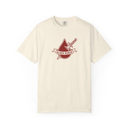 Thtgrlreads Bloodwing Academy collection features a vintage wash Comfort Colors graphic tee in cream with a red sword and banner emblem reading "Blood Guard" ideal for fans of fantasy romance and romantasy book merch.
