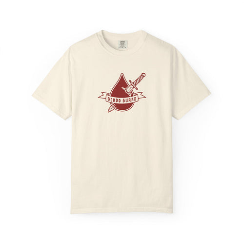 Thtgrlreads Bloodwing Academy collection features a vintage wash Comfort Colors graphic tee in cream with a red sword and banner emblem reading "Blood Guard" ideal for fans of fantasy romance and romantasy book merch.