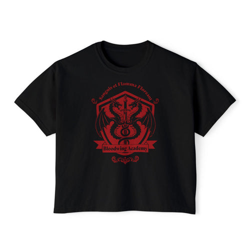 A black Comfort Colors crop top from thtgrlreads featuring the Bloodwing Academy collection with a vintage-wash feel and red gothic script crest graphic of a dragon and sword.