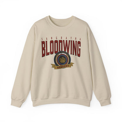 Thtgrlreads Bloodwing Academy crewneck sweatshirt featuring a vintage wash, Comfort Colors base with a bold printed crest graphic, part of officially licensed romantasy merch.