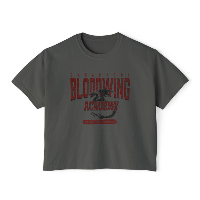 Bloodwing Academy crop top from thtgrlreads featuring a vintage wash Comfort Colors base in dark gray with a distressed red graphic of a dragon and gothic text, part of the Bloodwing Academy and Tees collections.