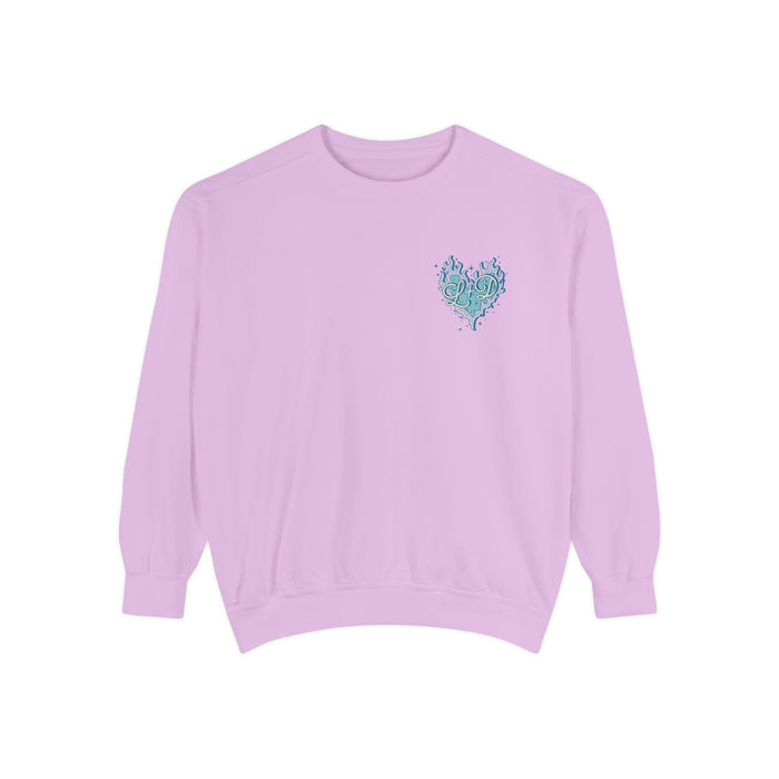 Zodiac Academy crewneck sweatshirt by thtgrlreads featuring a vintage-wash lavender Comfort Colors base and a small blue flame heart graphic on the chest.