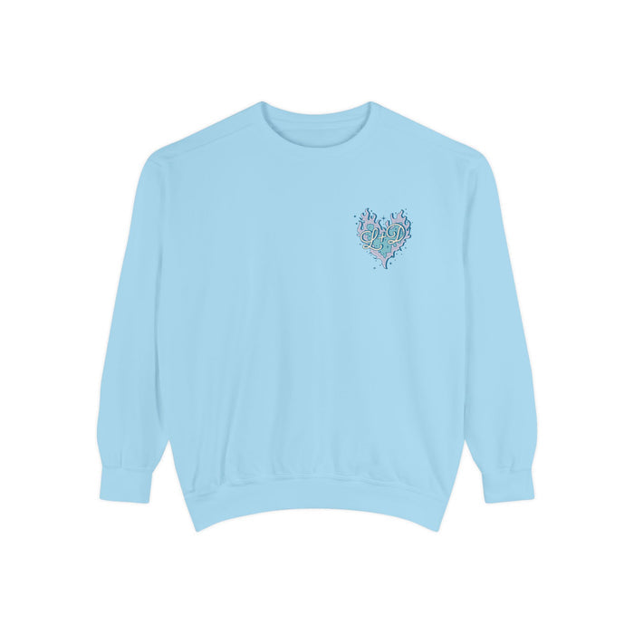 Zodiac Academy collection blue Comfort Colors oversized crewneck sweatshirt by thtgrlreads featuring a small pastel heart graphic with delicate detailing on chest, part of officially licensed bookish apparel.