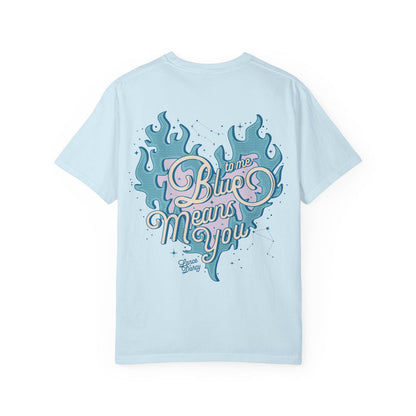 Zodiac Academy-inspired Comfort Colors graphic tee from thtgrlreads featuring a vintage wash light blue fabric with a whimsical "Blue means you" puff print design in pastel blues and pinks.