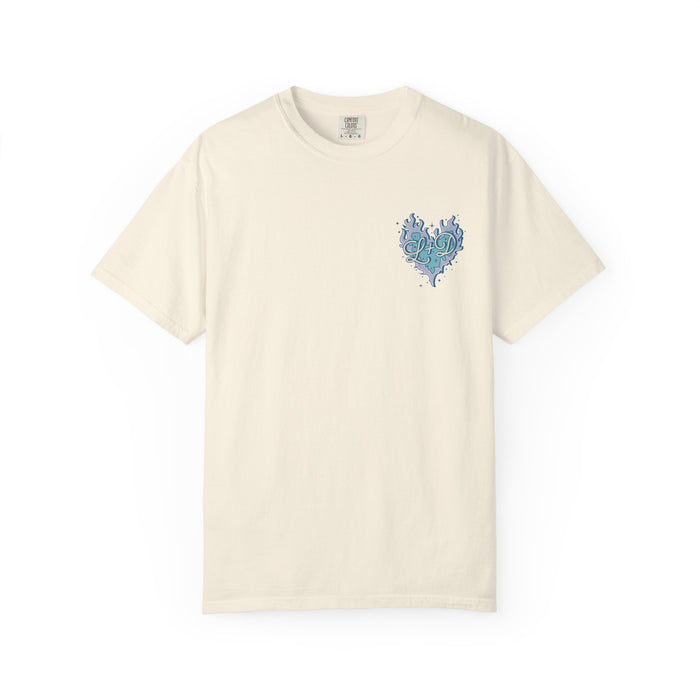 thtgrlreads official licensed bookish apparel featuring a vintage wash Comfort Colors unisex graphic tee with a blue heart design made of intricate swirling patterns on the chest.