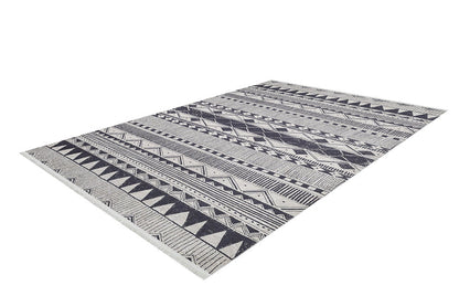 The Bohemian Sunrise - Washable Rug - JR1713 features a black and white geometric pattern with triangles, diamonds, and lines. Stylish and convenient for high-traffic areas, this rectangular rug is shown on a white background.