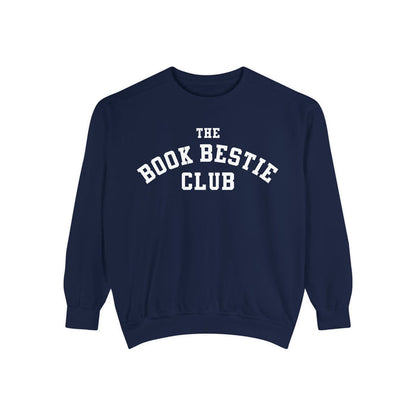 Navy oversized Comfort Colors crewneck sweatshirt from thtgrlreads Book Bestie collection featuring bold white collegiate-style text reading "The Book Bestie Club" across the chest.