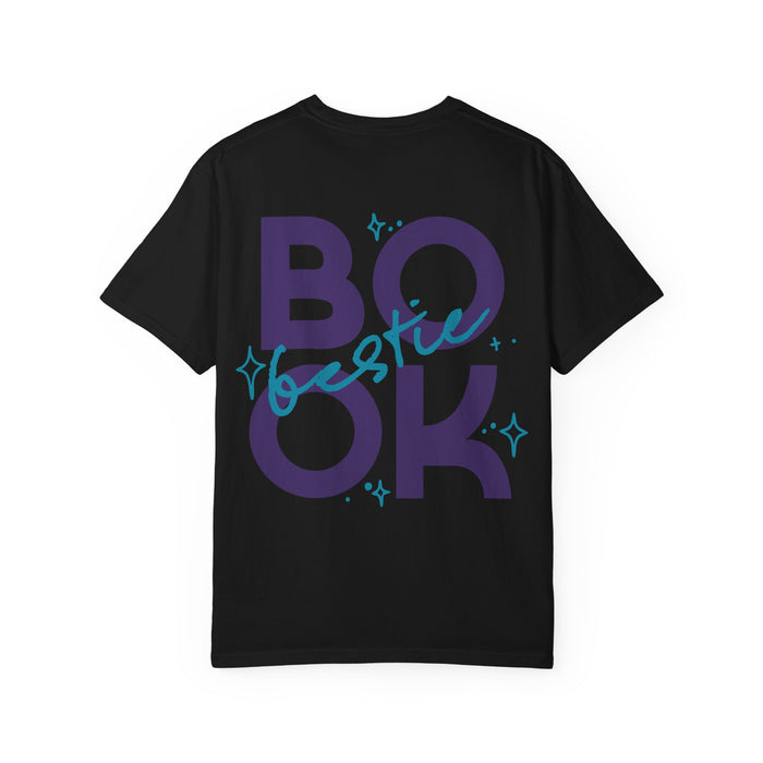 Thtgrlreads Book Bestie collection black Comfort Colors graphic tee featuring bold purple "BOOK" text with blue handwritten "bestie" overlay and star accents, unisex fit.