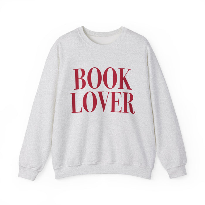 Thtgrlreads crewneck from the Crewnecks collection features a vintage-washed Comfort Colors fabric with bold red "BOOK LOVER" text printed on a cozy, unisex sweatshirt.