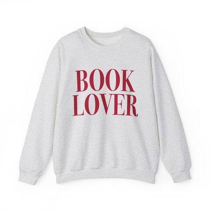 Thtgrlreads crewneck from the Crewnecks collection features a vintage-washed Comfort Colors fabric with bold red "BOOK LOVER" text printed on a cozy, unisex sweatshirt.