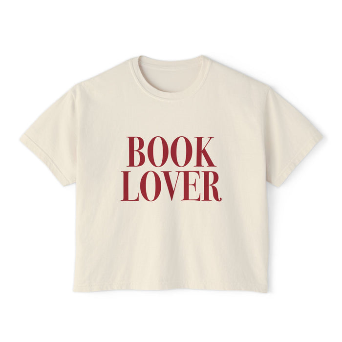 Thtgrlreads vintage-wash cream Comfort Colors cropped t-shirt from the Tees collection featuring bold red "BOOK LOVER" text in a classic serif font, perfect for bookish style.