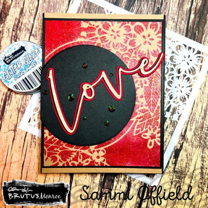 Brutus Monroe - Mixed Media Stencil - Floral Hoop. Made of a high quality plastic that will not wear down with use of a blending tool/sprays/inking. Designs can be used with large format pieces as well as small cards and the pattern will not be lost. Available at Embellish Away located in Bowmanville Ontario Canada. card made by Sammi Offield.