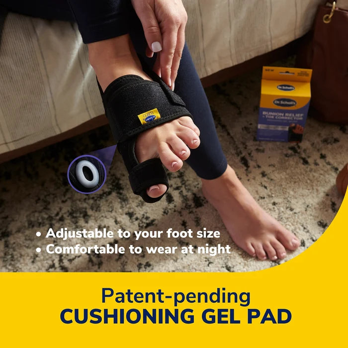 Bunion toe corrector with cushioning gel pad and adjustable strap, on foot.
