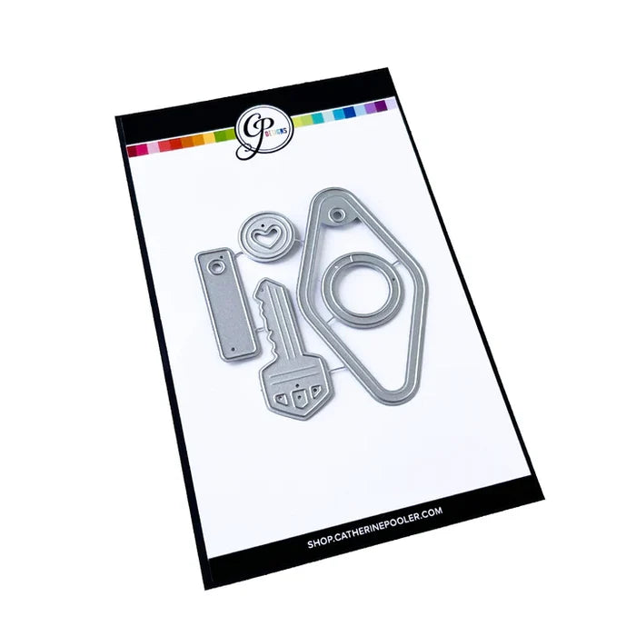 Catherine Pooler - Dies - Suite Motel Key. Create your own Suite Motel Key set with these fun dies. The dies include a key die, tags and "metal" keyring dies for so many fun layering options. Available at Embellish Away located in Bowmanville Ontario Canada.