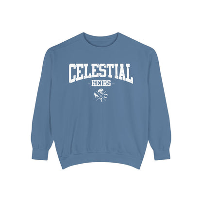 thtgrlreads Celestial Heirs oversized crewneck sweatshirt in vintage washed blue with bold collegiate block lettering and small crossed icons below the text