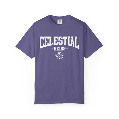 A vintage wash Comfort Colors graphic tee from thtgrlreads featuring distressed white collegiate-style text "Celestial Heirs" with crossed key and flame graphics, from the Zodiac Academy and Tees collections.