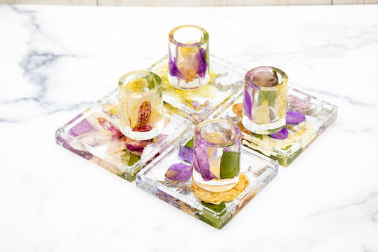 Landscape photo of a pressed flower orchid resin tray with colourful mixed dried flowers, lifestyle view