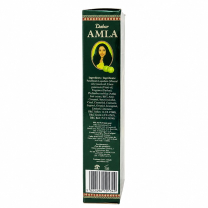 Dabur Amla Hair Oil, nourishing hair care oil enriched with amla extract, designed to moisturize the scalp, condition hair, and leave it looking smooth, shiny, and healthy.