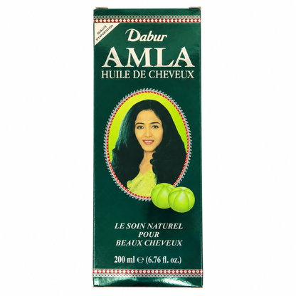 Dabur Amla Hair Oil, nourishing hair care oil enriched with amla extract, designed to moisturize the scalp, condition hair, and leave it looking smooth, shiny, and healthy.