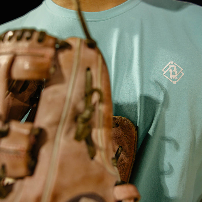 Adult model wearing blue Diamond Tech Vented Teal graphic tee