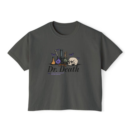 Nocticadia collection from thtgrlreads features a vintage-wash Comfort Colors dark gray crop top with gothic script "Dr. Death" text and whimsical alchemy bottle and skull graphic, part of fantasy romance Tees.