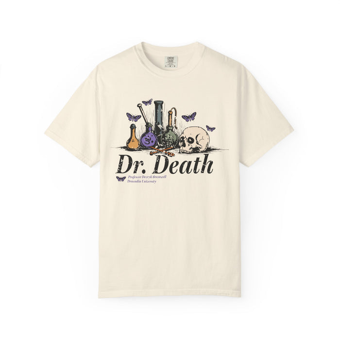 A vintage wash Comfort Colors graphic tee from thtgrlreads featuring a gothic design with laboratory glassware, a skull, and butterflies, inspired by Nocticadia themes.