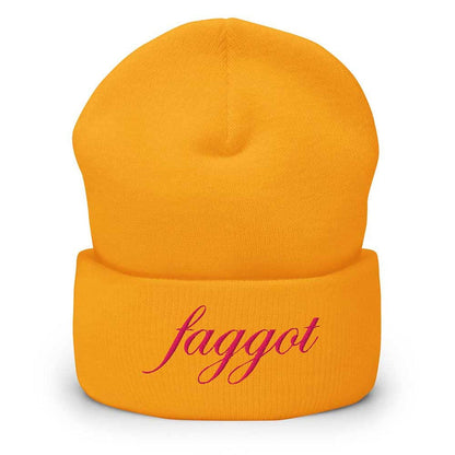 golden yellow beanie with faggot pink text on a white background