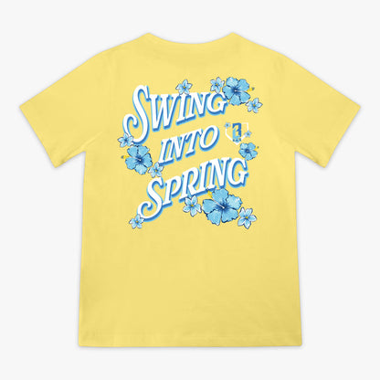 Yellow t-shirt with 'Swing into Spring' text and blue floral designs on a white background