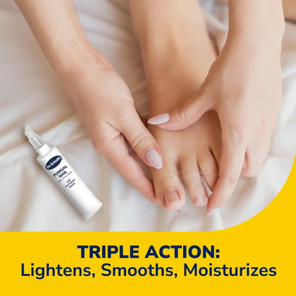 Hands applying nail liquid from the LED nail treatment device applicator