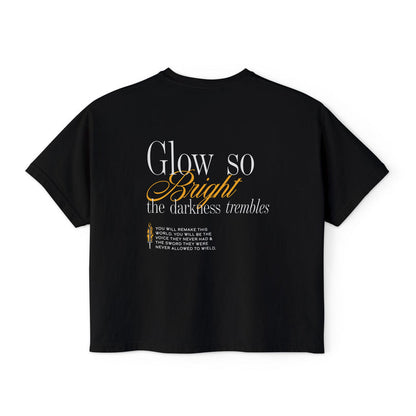 Kindred's Curse Saga crop top by thtgrlreads featuring a black Comfort Colors vintage wash crop t-shirt with a text design "Glow so Bright the darkness trembles" in white and gold script, part of officially licensed bookish apparel collections including gid://shopify/Collection/449367539962 and gid://shopify/Collection/467491553530.