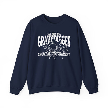 A navy oversized crewneck from thtgrlreads featuring Liv Zander collection text and a white vintage-style graphic reading “1st Annual Gravedigger Snowball Tournament” with a snowball splash design.