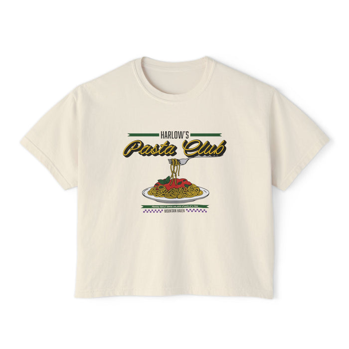 A cream-colored Comfort Colors cropped t-shirt from thtgrlreads featuring "Harlow's Pasta Club" vintage-style script and a colorful graphic of a fork twirling spaghetti over a plate, part of The Poison Daughter collection.