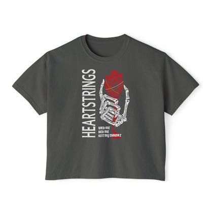 Liv Zander collection crop top from thtgrlreads features a dark gray Comfort Colors base with a vintage-inspired graphic of a skeletal hand holding a red anatomical heart and white bold text, offering a trendy, bookish aesthetic through this Printify apparel piece.